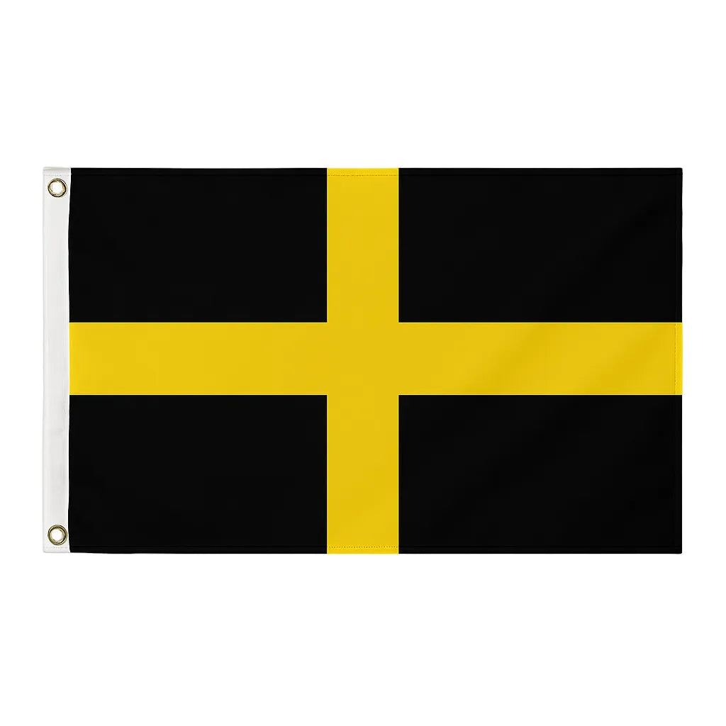 St David’s Cross novelty flag featuring a yellow cross on a black background, displayed with brass eyelets and white heading tape.