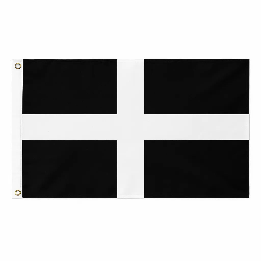 St Piran’s Cross novelty flag featuring a white cross on a black background, displayed with brass eyelets and white heading tape.