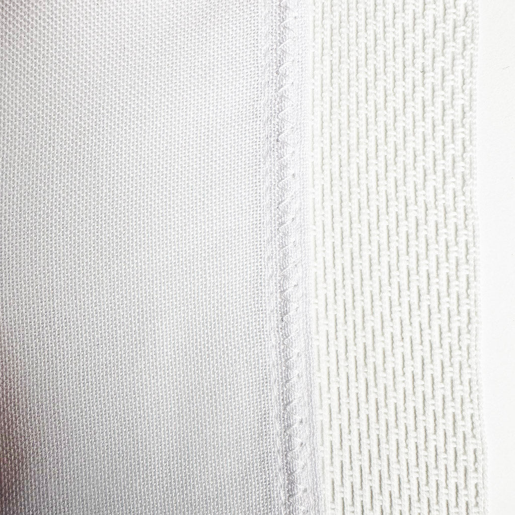Close-up of a textured sewn Union Flag  with antifray netting with subtle variations in colour.