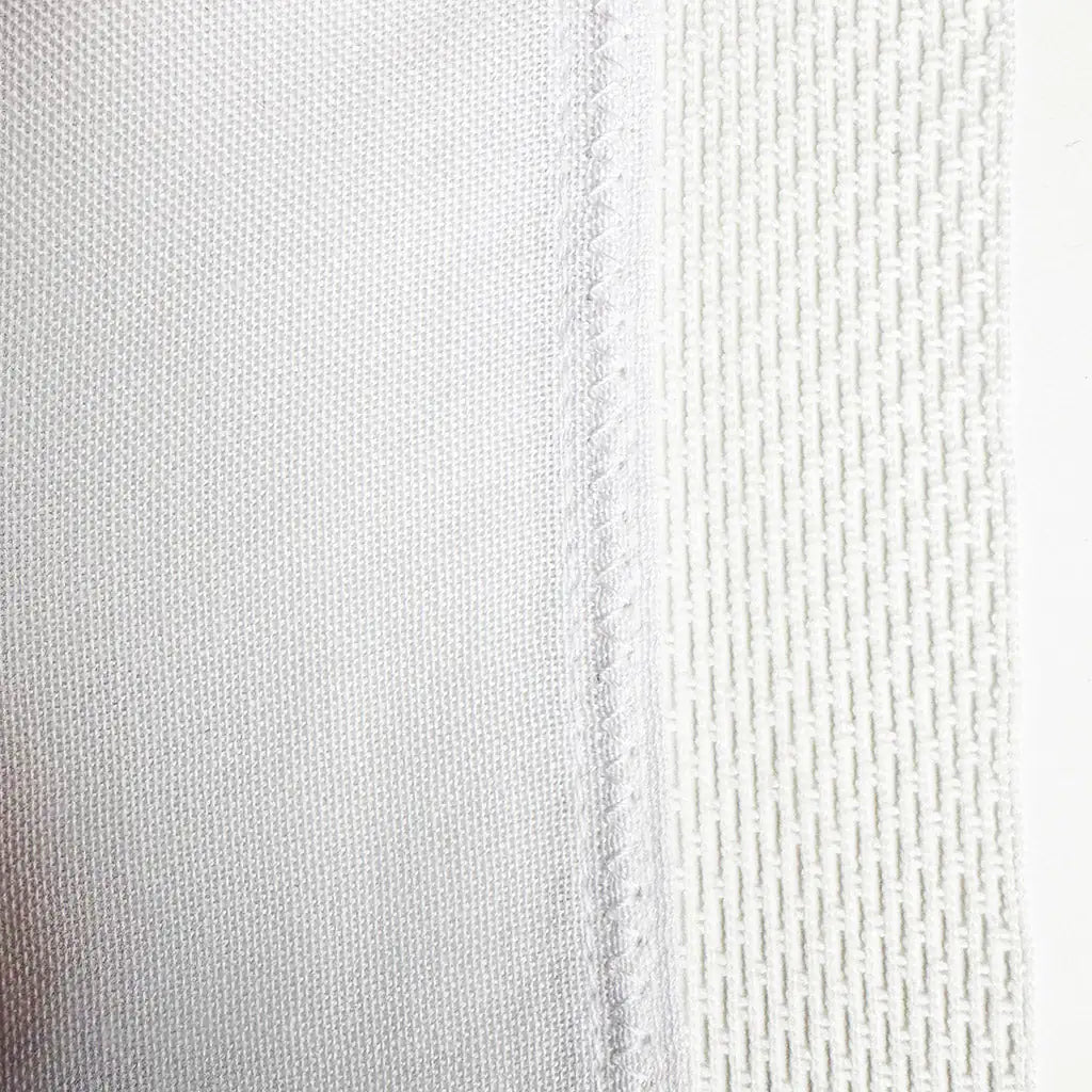 Close-up of a textured sewn Union Flag  with antifray netting with subtle variations in colour.