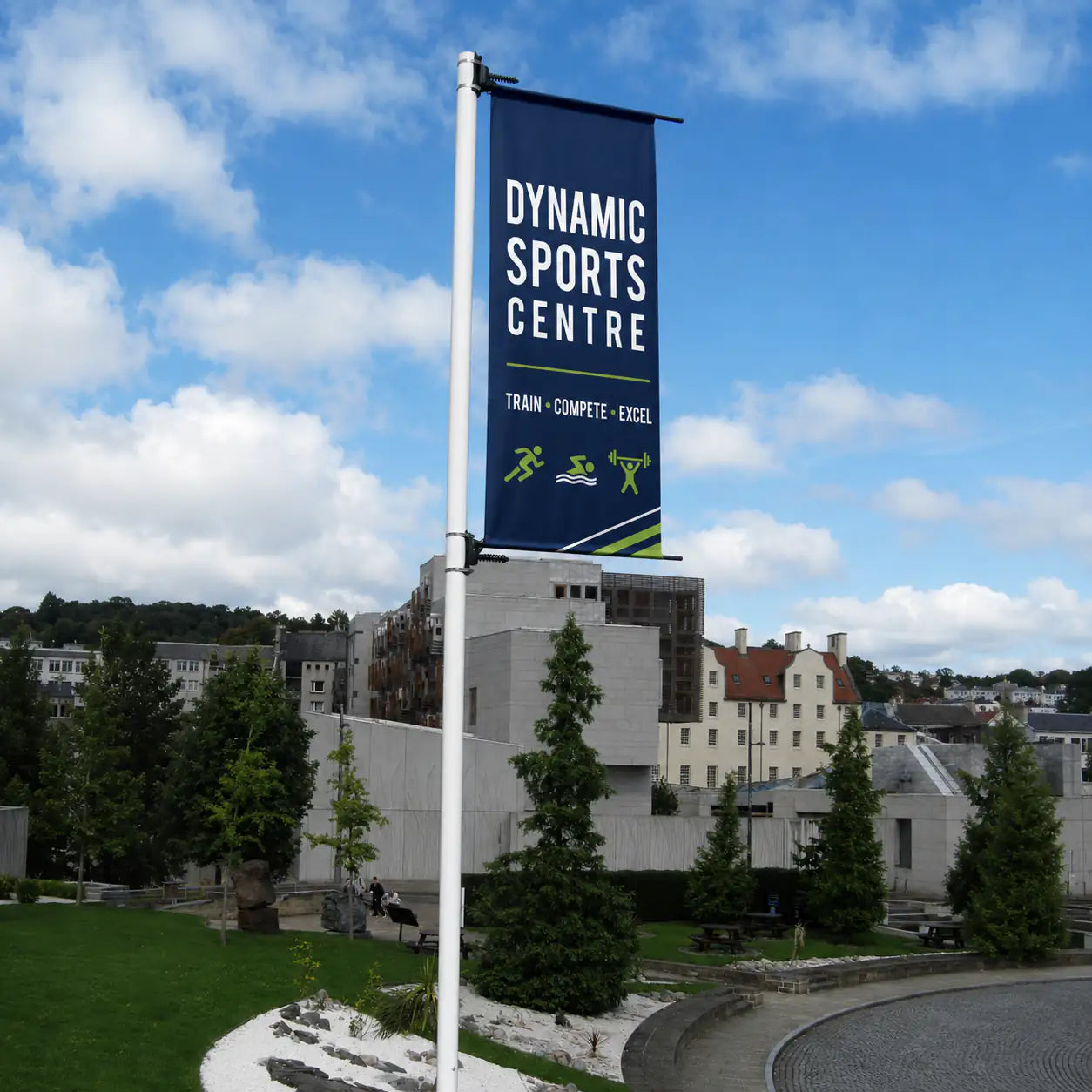 A 6m Tall Banner Post with a 1.5m tall banner fitted.