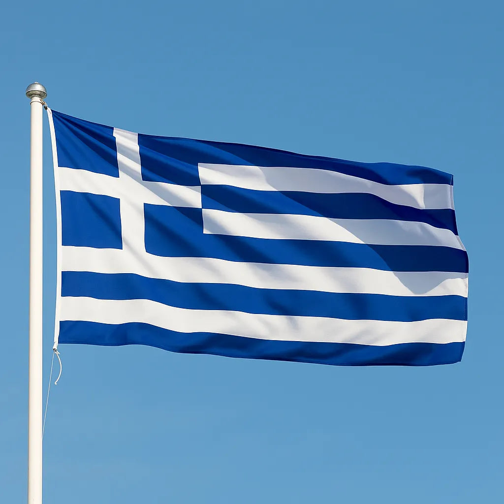Greek flag waving against a clear blue sky