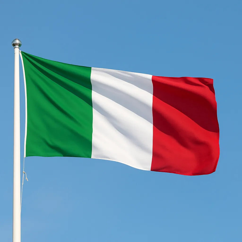 Italian flag waving against a clear blue sky
