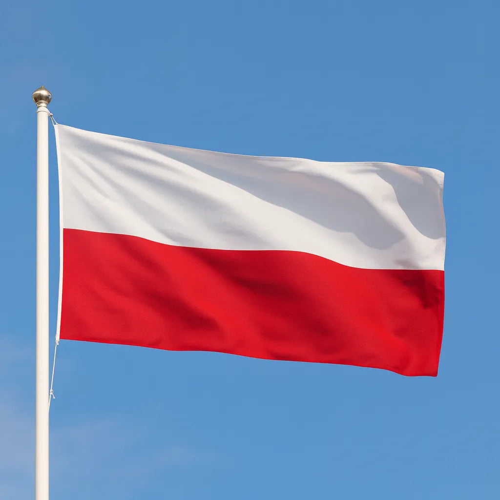 Polish flag waving against a clear blue sky