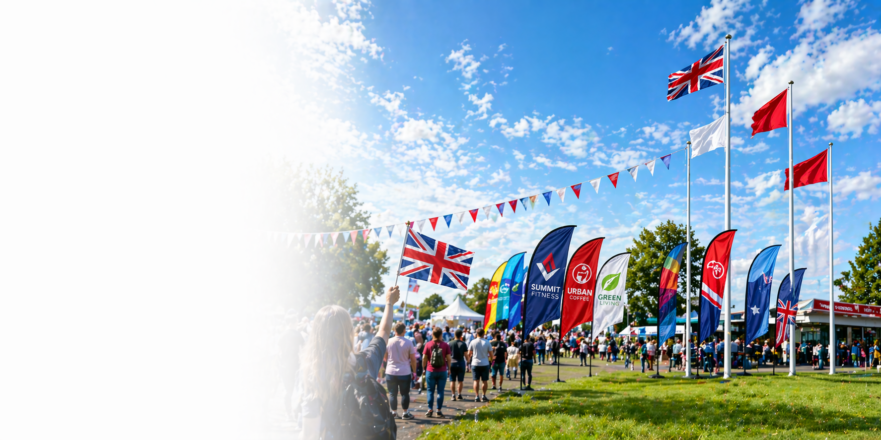 Various types of flags flying at a show ground