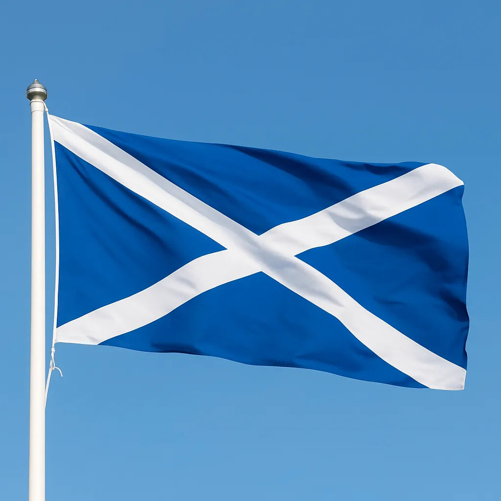 Scottish flag waving against a clear blue sky