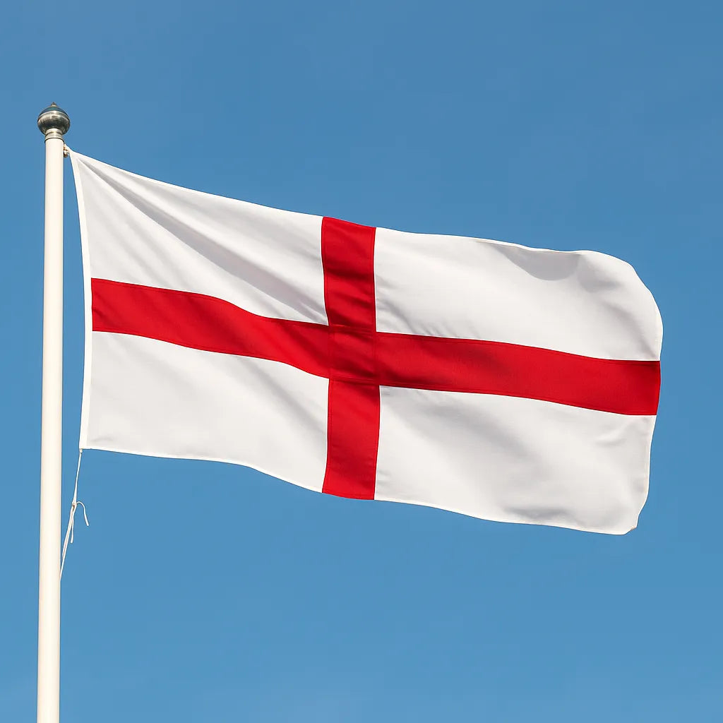 St George Cross Flag with a red cross on a white background against a clear blue sky