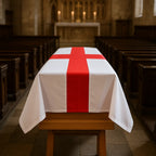 St george cross coffin drape in a church setting