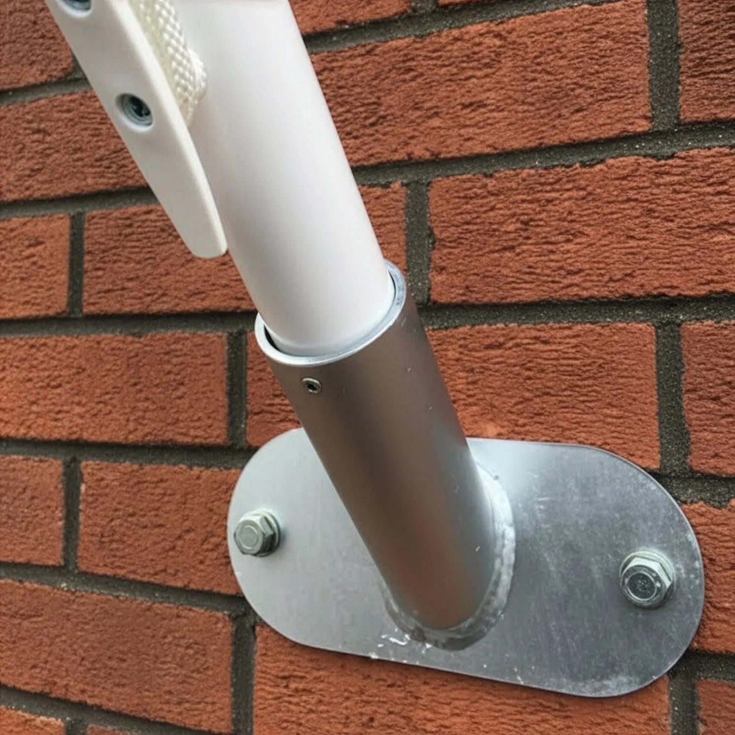 45 degree angled wall mounting flagpole brackets. Bracket is zinc colour.