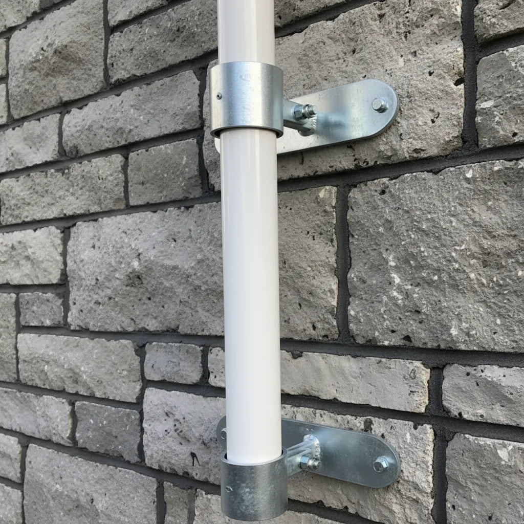 Wall Mounted Flagpole Brackets On a Brick Wall.
