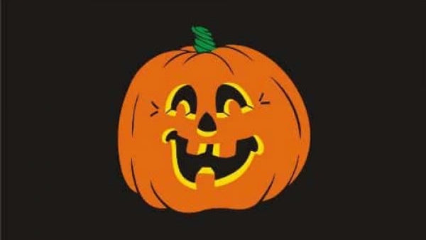 Jack-o'-lantern with a smiling face on a black background